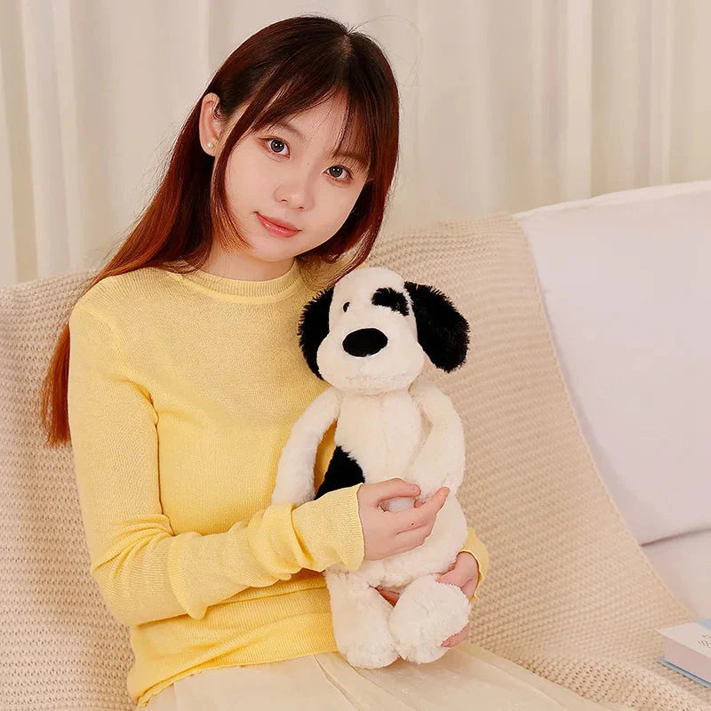 Plüschtier Schwarzer Und Weißer Hund – Kuscheltier - Stofftier